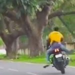 Szlifowanie twarzą asfaltu, po upadku na motorze.