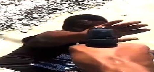 Strzał z broni w twarz